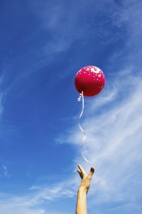 Red balloon blue sky